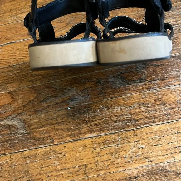 Chanel black leather and silver chain velcro logo sandals. Sandals